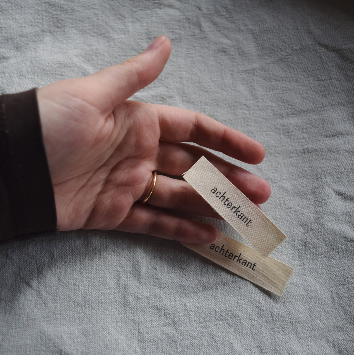 innaailabel 'achterkant'