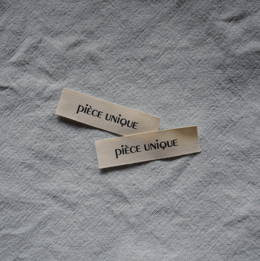 innaailabel 'pièce unique'
